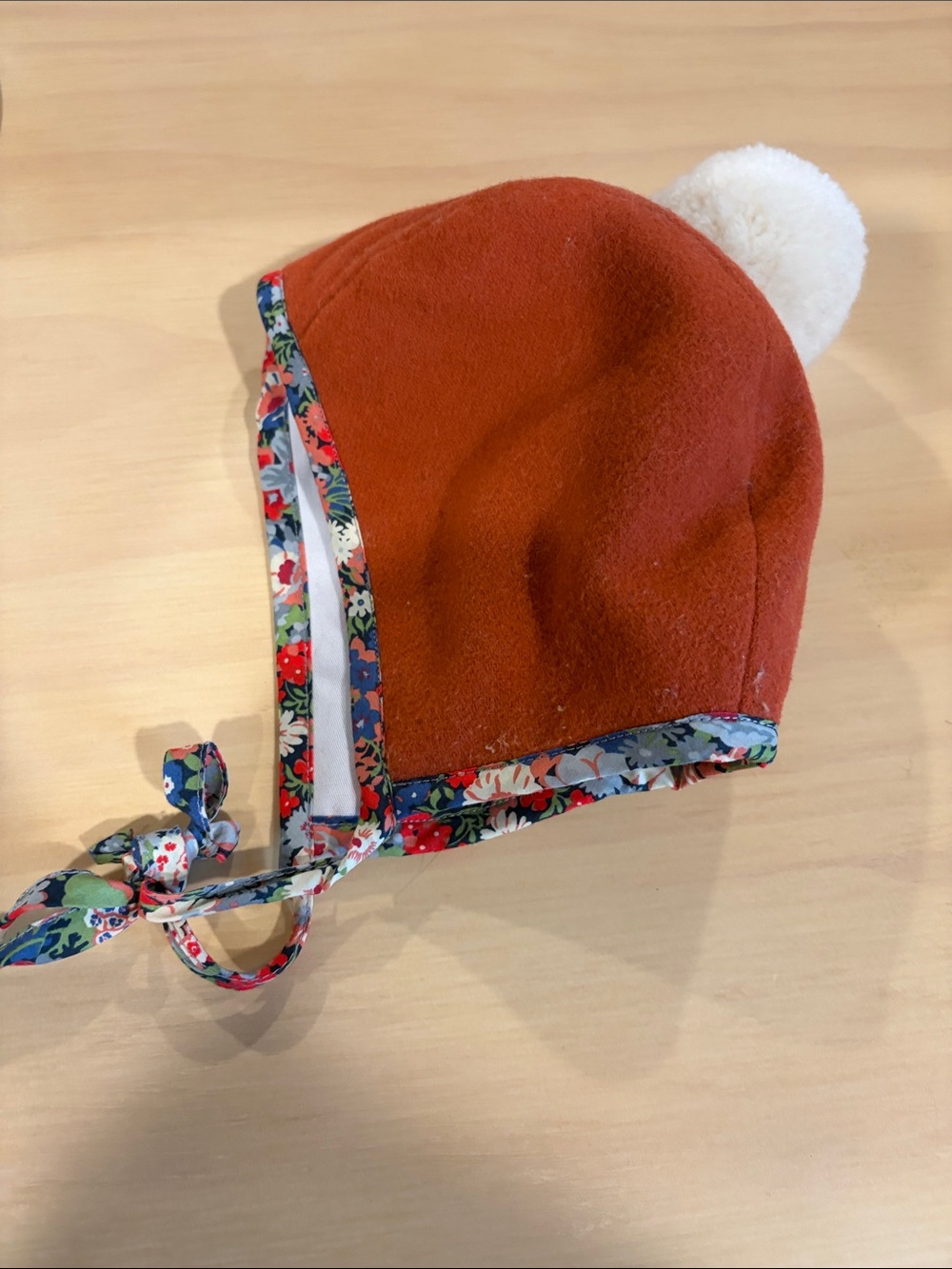 Infant deep dusty rose Pom Pom Hat with Floral Trim